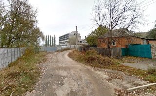 Фото ул. Милиционера и недостроенного многоэтажного здания Фото ул. Милиционера и недостроенного многоэтажного здания